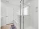Modern bathroom showcasing a tub with tiled surround and glass-enclosed shower at 234 Daniels Creek Cir, Goose Creek, SC 29445