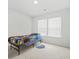 Bedroom with neutral carpet and a small window at 234 Daniels Creek Cir, Goose Creek, SC 29445