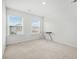 Bedroom with neutral carpet and two large windows at 234 Daniels Creek Cir, Goose Creek, SC 29445