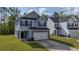 Beautiful two-story home with a two-car garage and a welcoming front entrance at 234 Daniels Creek Cir, Goose Creek, SC 29445