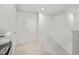 Upstairs hallway features ample lighting and closet space at 234 Daniels Creek Cir, Goose Creek, SC 29445