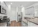 Bright kitchen features stainless steel appliances, granite countertops, and ample cabinet space at 234 Daniels Creek Cir, Goose Creek, SC 29445