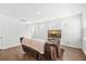 Cozy living room features hardwood floors, a comfortable chair, and a large flat screen television at 234 Daniels Creek Cir, Goose Creek, SC 29445