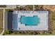 Aerial view of a community pool featuring ample seating, landscaped surroundings, and clear blue water at 234 Daniels Creek Cir, Goose Creek, SC 29445