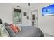 Cozy bedroom with large window, flat screen TV, and easy access to the ensuite bath at 24 Hanover St, Charleston, SC 29403