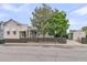 Charming home featuring a fenced yard, mature trees, and convenient off street parking at 24 Hanover St, Charleston, SC 29403