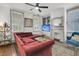 This spacious living room has bright windows, built-ins, and a decorative fireplace at 24 Hanover St, Charleston, SC 29403