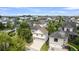 Aerial view of a residential neighborhood showcasing well-maintained homes, mature trees, and manicured lawns at 2405 Louisville St, Charleston, SC 29492