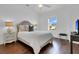 Comfortable bedroom with wood floors, neutral color palette and a window at 2405 Louisville St, Charleston, SC 29492