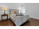 Comfortable bedroom with wood floors, neutral color palette and a window at 2405 Louisville St, Charleston, SC 29492