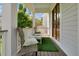 Inviting front porch with comfortable seating, decorative accents, and a welcoming entrance at 2405 Louisville St, Charleston, SC 29492