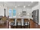 Stylish kitchen featuring marble countertops, stainless steel appliances, and island seating with pendant lighting at 2405 Louisville St, Charleston, SC 29492