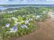 Aerial view of a waterfront residential community with marsh views at 2444 Darts Cove Way, Mount Pleasant, SC 29466