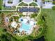 An aerial image showcasing the community pool, clubhouse, manicured grounds, and outdoor recreational spaces at 2444 Darts Cove Way, Mount Pleasant, SC 29466