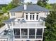 Aerial view of a home with a multi-level deck and screen porch, perfect for outdoor living at 2444 Darts Cove Way, Mount Pleasant, SC 29466