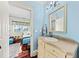 Charming bathroom featuring a vanity with marble countertop and view into bedroom at 2444 Darts Cove Way, Mount Pleasant, SC 29466
