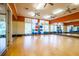 A bright and airy fitness center with exercise equipment, mirrors, and ample natural light at 2444 Darts Cove Way, Mount Pleasant, SC 29466