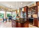 Open kitchen featuring custom cabinets, stainless appliances, and a breakfast nook at 2444 Darts Cove Way, Mount Pleasant, SC 29466