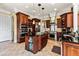Well-equipped kitchen features custom cabinetry, granite countertops, and stainless steel appliances at 2444 Darts Cove Way, Mount Pleasant, SC 29466