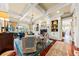 Cozy living room features a fireplace, built-in shelves, and coffered ceilings at 2444 Darts Cove Way, Mount Pleasant, SC 29466