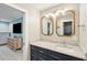 Modern bathroom featuring double sinks and a doorway to the Primary bedroom at 248 Forest Trail, Isle of Palms, SC 29451
