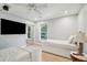 Bright bedroom featuring two twin beds, natural light, and ample closet space at 248 Forest Trail, Isle of Palms, SC 29451