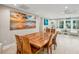 Dining room featuring a large wooden table, and a view to the outside at 248 Forest Trail, Isle of Palms, SC 29451