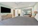 Large main bedroom featuring mirrored closet doors and an ensuite bathroom at 248 Forest Trail, Isle of Palms, SC 29451