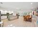 Bright, open-concept space with a modern kitchen, dining area, and living room at 248 Forest Trail, Isle of Palms, SC 29451