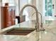 Close up of marble counter and sink with modern faucet at 248 Forest Trail, Isle of Palms, SC 29451