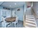 Cozy dining area with round wooden table and access to outdoor patio at 249 Oak View Way, Summerville, SC 29483