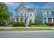 Charming two-story home with gray siding, white trim, landscaped yard, and welcoming blue front door at 249 Oak View Way, Summerville, SC 29483