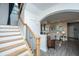 Welcoming foyer with staircase and archway, showcasing the open layout and inviting atmosphere of the home at 249 Oak View Way, Summerville, SC 29483