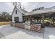 Outdoor grilling station featuring stainless steel grills, brick base, and ample counter space for outdoor cooking at 249 Oak View Way, Summerville, SC 29483