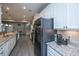 Stylish kitchen featuring granite countertops and stainless steel appliances at 249 Oak View Way, Summerville, SC 29483