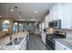 Modern kitchen with stainless steel appliances, granite countertops, and ample cabinet space for cooking at 249 Oak View Way, Summerville, SC 29483