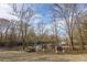 Scenic lake view with picnic tables providing a serene spot for relaxation and outdoor enjoyment at 249 Oak View Way, Summerville, SC 29483