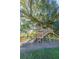 Fun treehouse playground with a slide and sturdy wooden construction, perfect for outdoor adventures at 249 Oak View Way, Summerville, SC 29483