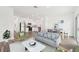 Bright, open-concept living space with modern kitchen and a dining area at 2605 Scarlett Maple St, Summerville, SC 29486