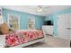Cheerful bedroom with colorful walls, white furniture, and two bright windows at 2840 Conservancy Ln, Charleston, SC 29414