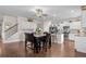 Open dining area features a ceiling fan and flows into the kitchen, perfect for gatherings at 2840 Conservancy Ln, Charleston, SC 29414