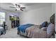 Cozy bedroom with natural light, ceiling fan, and carpeted floors at 2880 Cavalcade Cir, Johns Island, SC 29455