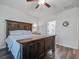Spacious bedroom with dark wood accents, ceiling fan, and ensuite bathroom at 2880 Cavalcade Cir, Johns Island, SC 29455