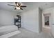 Bedroom featuring a cozy bed, nightstand, natural light, and shelving unit at 2880 Cavalcade Cir, Johns Island, SC 29455