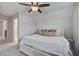 Comfortable bedroom with a ceiling fan and access to an attached bathroom at 2880 Cavalcade Cir, Johns Island, SC 29455