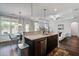 Open-concept kitchen and eat in area with modern features and stainless steel appliances at 2880 Cavalcade Cir, Johns Island, SC 29455