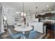 Bright living space showcasing an open floor plan and blending the kitchen and dining areas at 2880 Cavalcade Cir, Johns Island, SC 29455