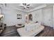 Bright open living area featuring a white sectional couch and recessed lighting throughout at 2880 Cavalcade Cir, Johns Island, SC 29455