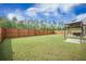 Large, green backyard with a privacy fence, offering ample space at 293 Firewheel Ct, Summerville, SC 29486