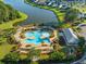 Aerial view of community pool area showcasing pools, lounging spots and lake at 293 Firewheel Ct, Summerville, SC 29486